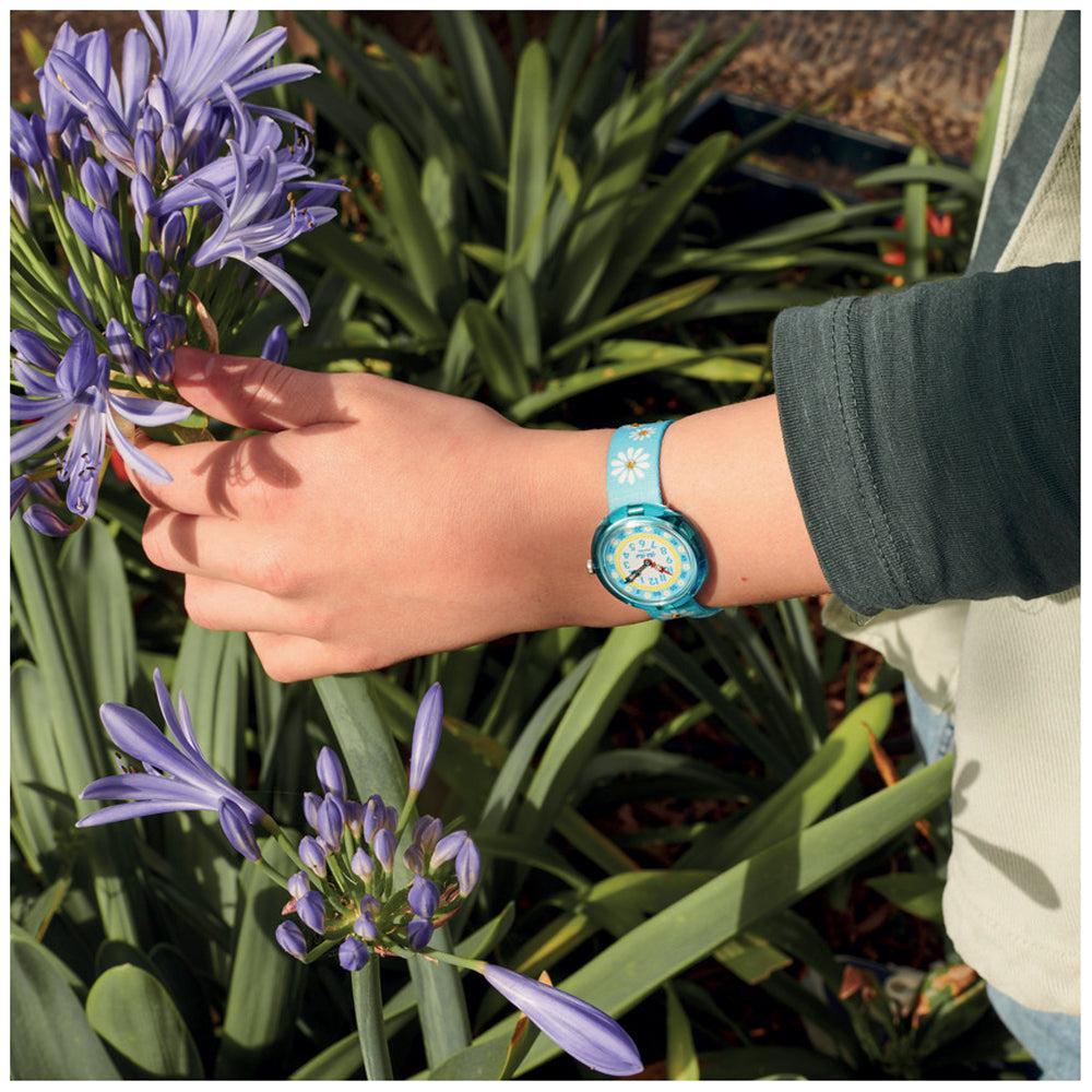 sparkling daisy Kids Watch by Flik Flak by Swatch - Available at SHOPKURY.COM. Free Shipping on orders over $200. Trusted jewelers since 1965, from San Juan, Puerto Rico.