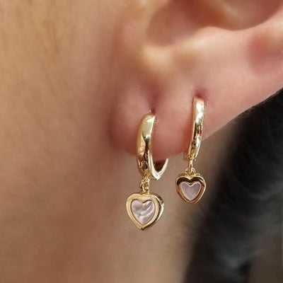 Mini Mother Pearl Heart Huggie Earrings by Kury - Available at SHOPKURY.COM. Free Shipping on orders over $200. Trusted jewelers since 1965, from San Juan, Puerto Rico.