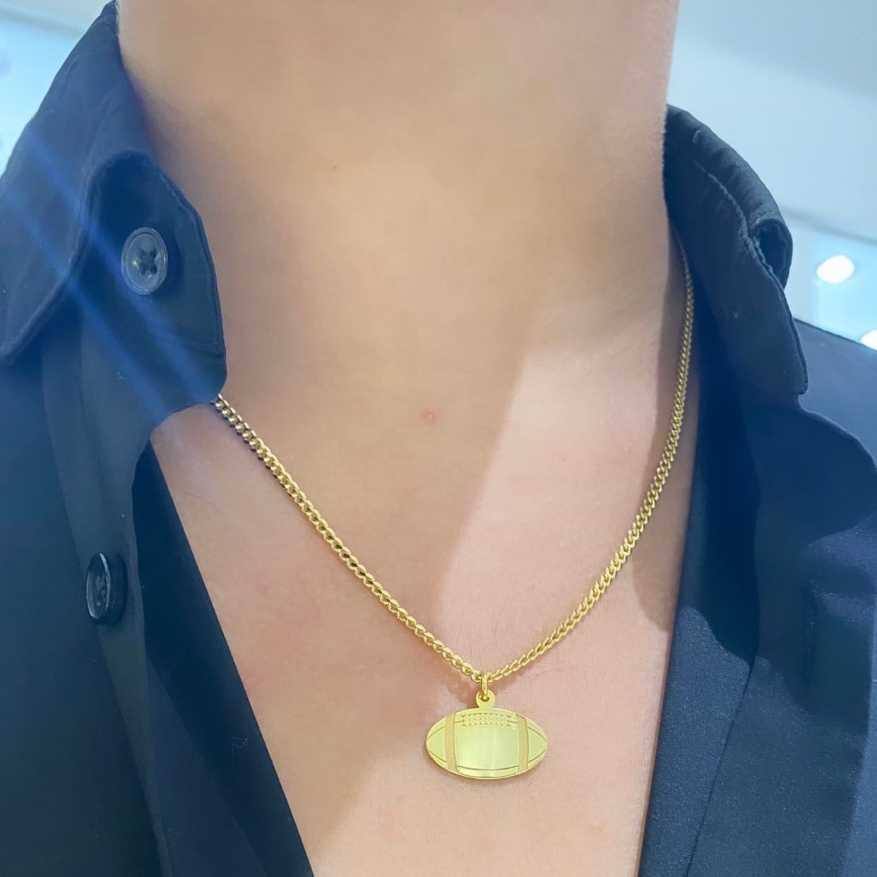 FootBall Pendant 14K by Kury - Available at SHOPKURY.COM. Free Shipping on orders over $200. Trusted jewelers since 1965, from San Juan, Puerto Rico.