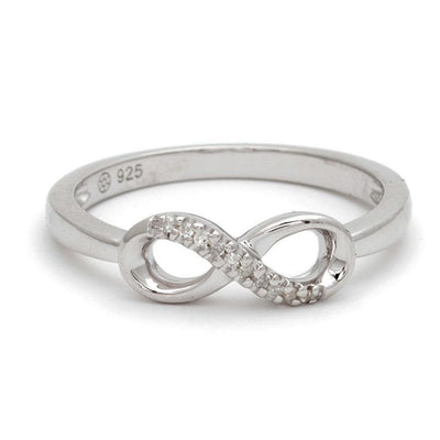 Diamond Infinity Ring by KURY - Available at SHOPKURY.COM. Free Shipping on orders over $200. Trusted jewelers since 1965, from San Juan, Puerto Rico.