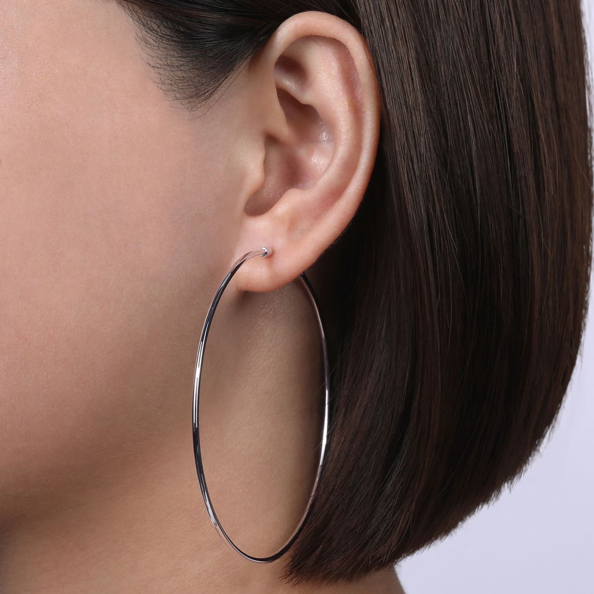 70mm White Gold Hoop Earrings by Gabriel & Co. - Available at SHOPKURY.COM. Free Shipping on orders over $200. Trusted jewelers since 1965, from San Juan, Puerto Rico.