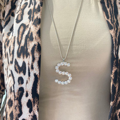 XL S Initial Silver/Clear Pendant by Rebecca - Available at SHOPKURY.COM. Free Shipping on orders over $200. Trusted jewelers since 1965, from San Juan, Puerto Rico.