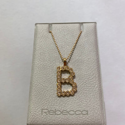 B Initial Bling Pendant Rose/Champagne by Rebecca - Available at SHOPKURY.COM. Free Shipping on orders over $200. Trusted jewelers since 1965, from San Juan, Puerto Rico.