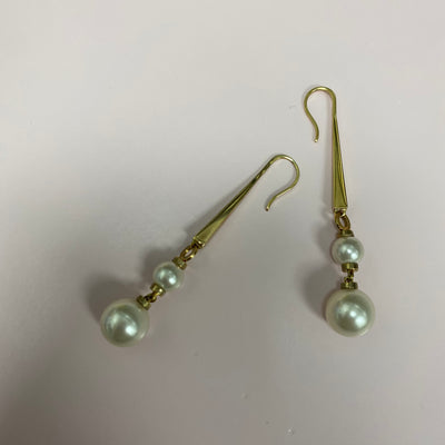 Trilogy Swarovski Pearl Golden Earrings by Rebecca - Available at SHOPKURY.COM. Free Shipping on orders over $200. Trusted jewelers since 1965, from San Juan, Puerto Rico.